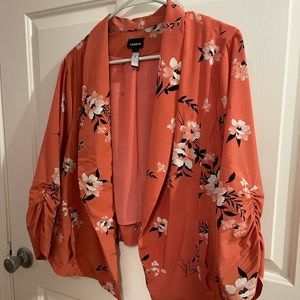 Just in time for spring! Super cute floral print blazer.